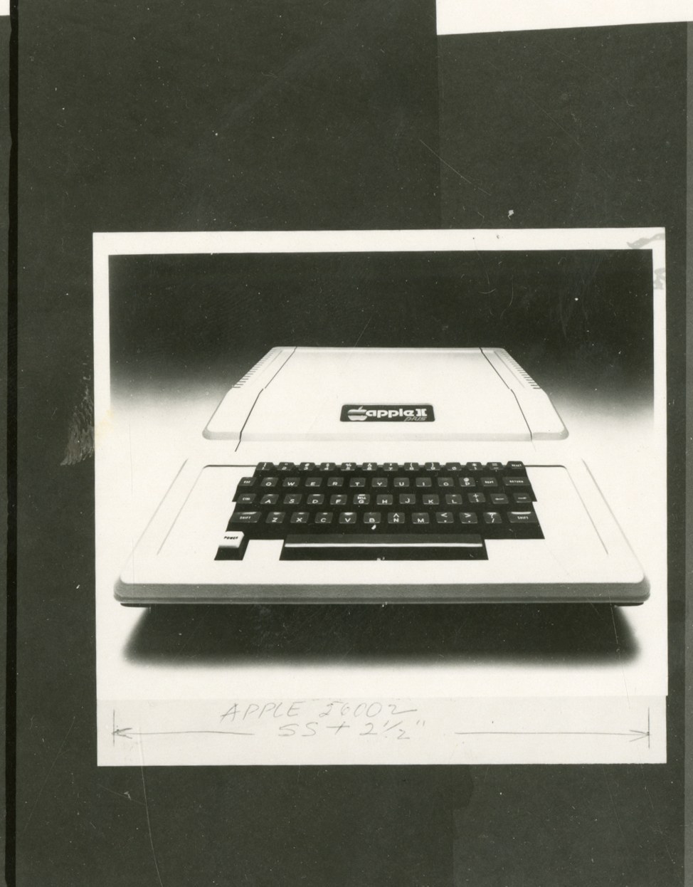Apple II Plus product photograph with handwritten sizing notation APPLE 56002 5S plus 2 and a half inches